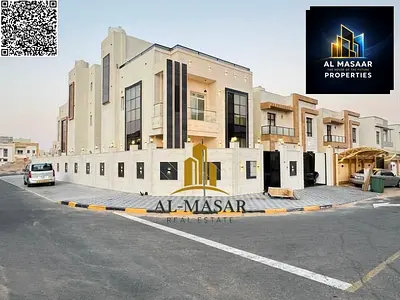 Corner villa in Al Zahia, Ajman, two floors and a roof, central air conditioning, freehold ownershi