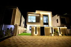For sale a villa in Al Zahia, Ajman, 5 master bedrooms, a hall, a hall, 3 floors with a large swimmi