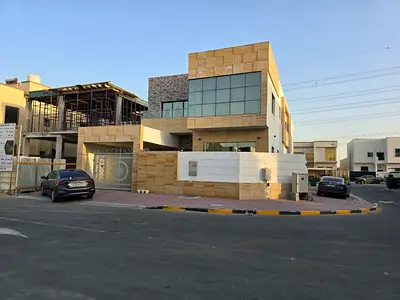 For rent in Al Yasmin, Ajman, a villa consisting of 5 master bedrooms, a majlis, a living room, and a maid's room