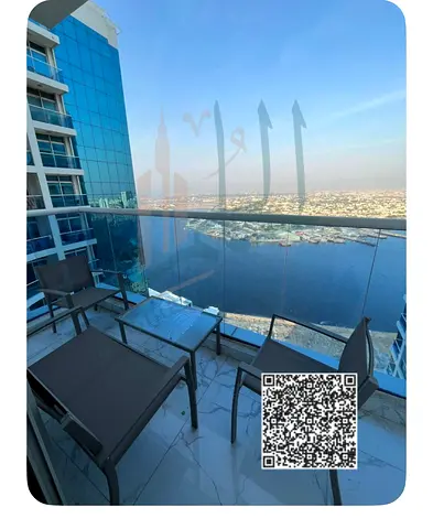 For annual rent – ​​Two-bedroom apartment with a living room and direct view of the creek in Ajman
