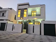 sign, includingFor sale, a villa in Al Bahia, modern de air conditioning, five master bedrooms, a li