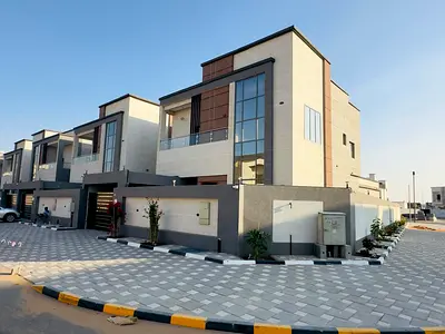 For rent a villa in Al Helio 2 in Ajman, 4 master bedrooms, a majlis, a hall, a maid's room, and a store
