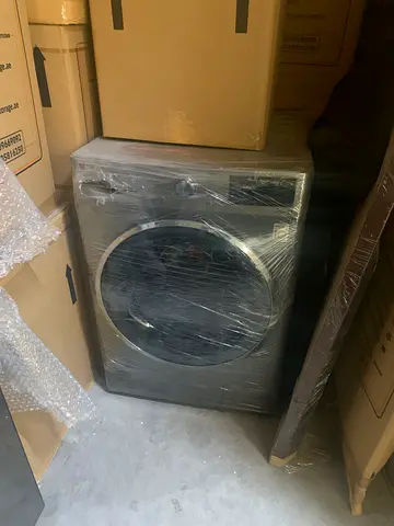Front-load washing machine (wrapped/stored) - good condition