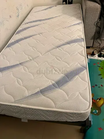 Single mattress in good condition - firm support, clean