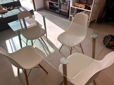 Glass Top Dining Table with 4 White Modern Chairs - Good Condition