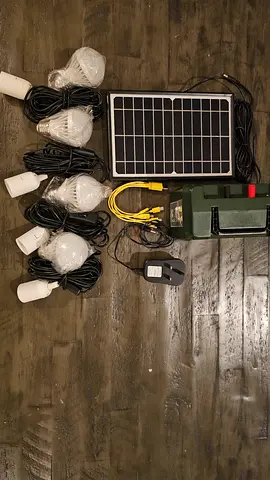 Portable Solar Lighting Kit with 4 LED Bulbs and Battery Pack