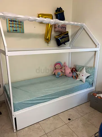Home r us, kids double pull out bed with mattresses.