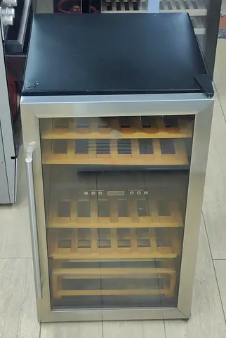 Hoover new model wine fridge   Excellent condition perfect working free delivery with warranty