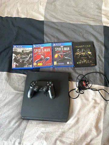 Playstation 4 Slim 1TB + controller + games