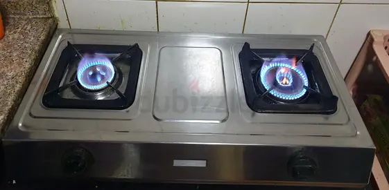 Two-burner stainless steel gas stove — used, good working condition