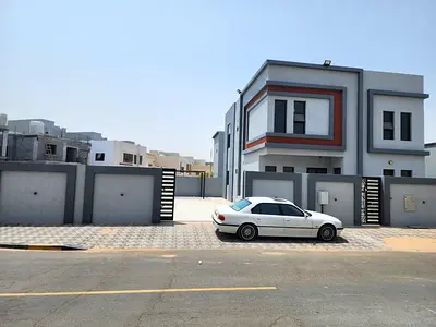 Villa for sale in Al Zahia Corner with electricity and water - area 5,400 sq ft, two floors, 5 master bedrooms with built-in wardrobes, maid's room, l
