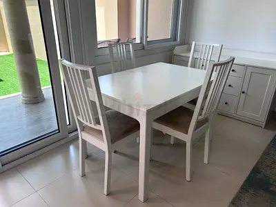 Ikea Dining table expandable with 4 chairs and sideboard