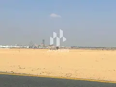 Hot Deal Plot in Al Sahmah on 36m Road | 2,991 Sq. Ft. for AED 435,000 | Prime Location Between Sahm