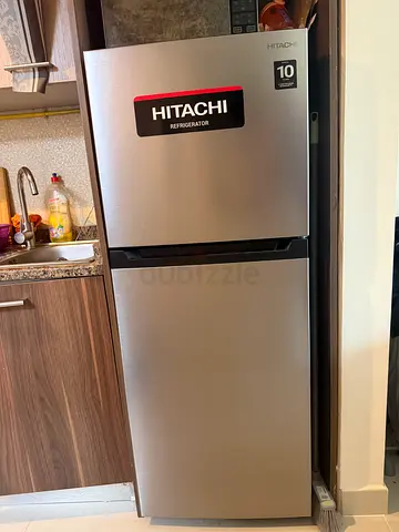 Compact Silver Refrigerator with Freezer Compartment