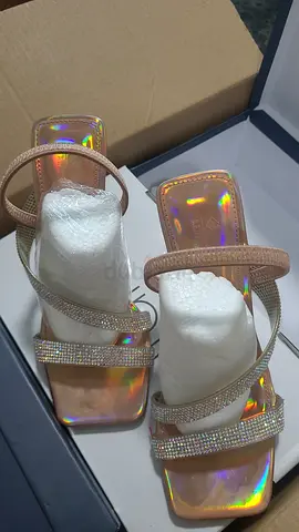 Pair of womens heeled sandals with rhinestone straps, size 37