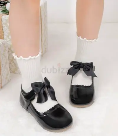 Pair of black patent Mary Jane girls shoes with bows - excellent condition