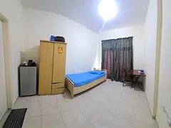Executive Bachelor room with attached bathroom and balcony in Shabiya 9 near Dunes School