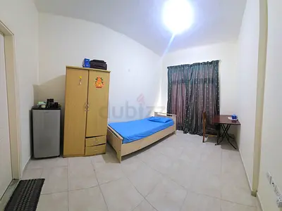 Executive Bachelor room with attached bathroom and balcony in Shabiya 9 near Dunes School