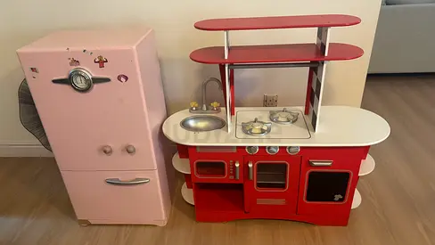 Kids play kitchen set with a fridge