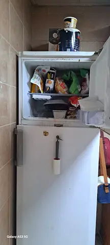 Used single-door upright freezer / refrigerator - good working condition