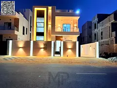 A luxurious modern villa for sale in Al Yasmin, featuring a modern design and high-end finishes.