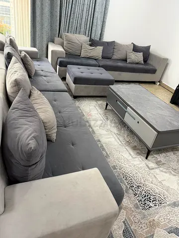 Grey L-shaped Sofa Set with Cushions and Ottoman - Good Condition