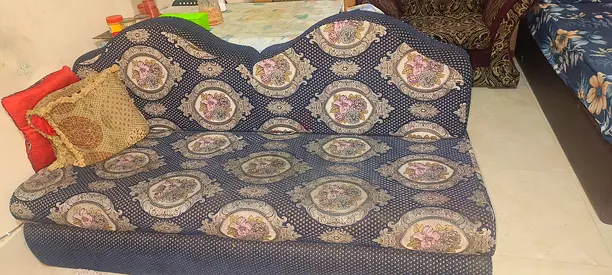 Used upholstered 2-seater sofa/chaise with floral pattern - good condition