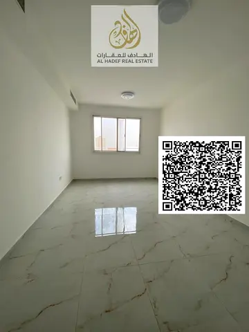One bedroom and living room for rent in Al Jurf 3, Ajman, with two bathrooms, a balcony, an open view, and excellent finishing. Payment in 4 or 6 inst
