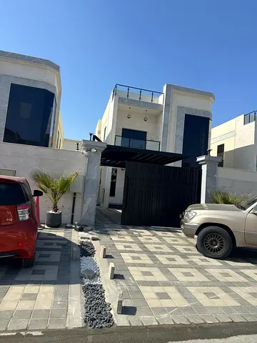 🏡 For sale: Super deluxe villa in Al Rawda 3, Ajman. 5 master bedrooms, majlis, 2 living rooms, 2 kitchens, maid's room, and swimming pool. 2.35 mill