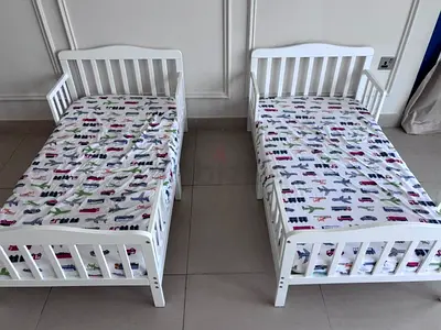 Pair of White Wooden Toddler Beds with Mattresses