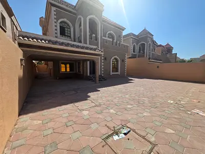 Villa for rent in Al Muwaihat, residential/commercial, five rooms, majlis, hall, and maid's room.