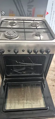 Used 4-Burner Stainless Steel Gas Cooker with Oven - Functional