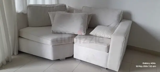 Light beige L-shaped sofa - good condition