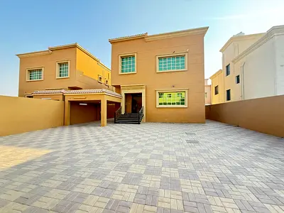 Villa for sale in Al Rawdah 1, second plot from the main street, next to a mosque and close to all services. 5 bedrooms, living room, majlis, and maid