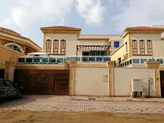 For sale in Al Muwaihat 2, a villa with 6 master bedrooms, a majlis, a living room, a maid's room, a