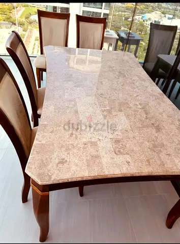 Dining table marble and velvet seatings