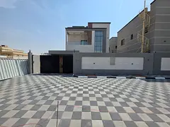 For sale in Ajman, Al Rawda 2 area, modern design villa, central air conditioning, 5 rooms, a living