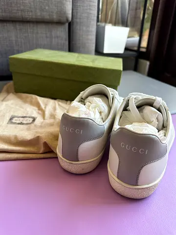 Used Gucci womens white leather sneakers, size 39.5