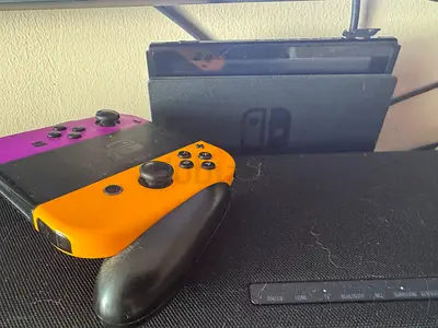 Nintendo Switch console with dock and Joy-Con controllers (used) and all these games.