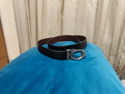 Brand New COACH Signature Buckle Cut-To-Size Reversible Belt, featuring a distinct silver-tone C
