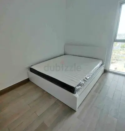 IKEA malam king‑size bed (180 × 200 cm) with 2 storage drawers and an IKEA mattress