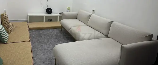 Light grey modern L-shaped fabric sofa (3-seater with chaise) - good condition /  Table  Stool
