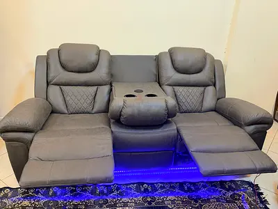 Three seater sofa with recliner with two cupholders with MagSafe charger with light