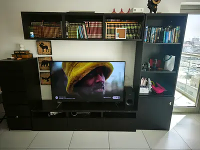 Tall narrow dark wood storage cabinet with flip-top compartment, original price 2900 from Ikea only