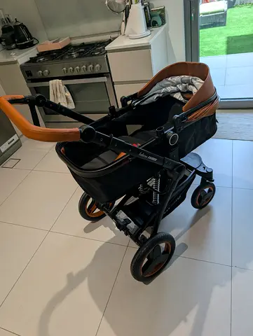 Luxury 2-in-1 Baby Stroller / Bassinet in Black with Brown Trim - brand new, Belecoo
