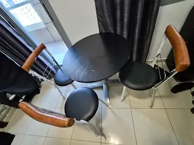 NEW CONDITION -compact 3-Seater Round Dining Table with Stools and Leather-Backed Chairs
