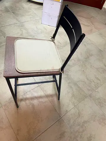 Simple metal-frame dining chair with wooden seat - used