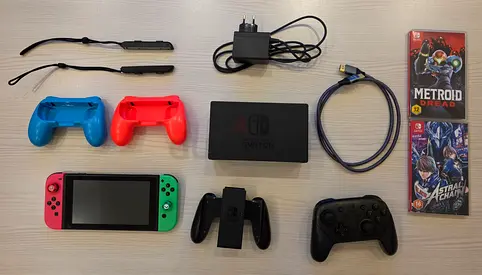 Nintendo Switch Bundle with Pro Controller + 2 Games (Metroid  Astral Chain)