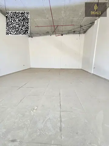 Large commercial shop for rent in Al-Jarf 1, with ample space and a prime location.