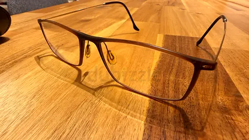 Minimalist brown prescription glasses with case